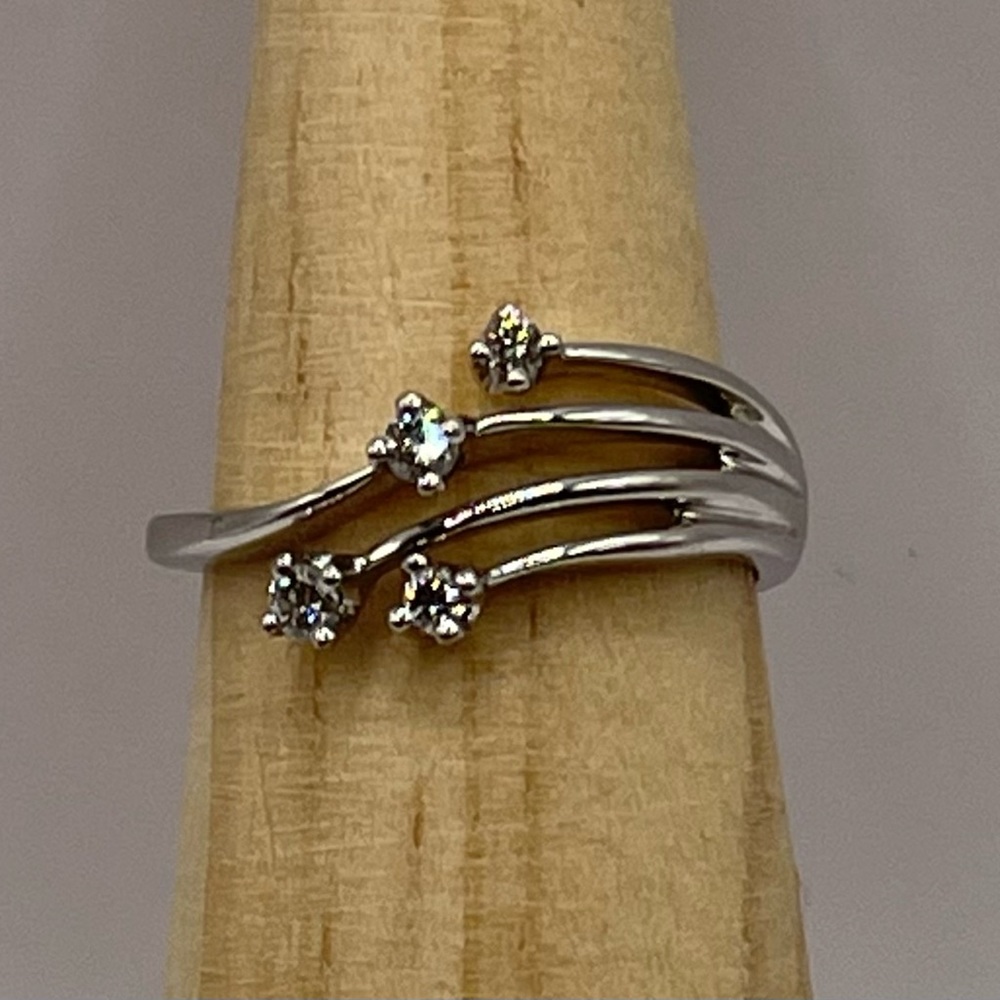 Diamond 14K white gold women’s cocktail ring. Four diamonds 1/10 carat. Size 5.5